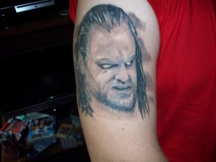 Undertaker Picture Tattoo On Arm